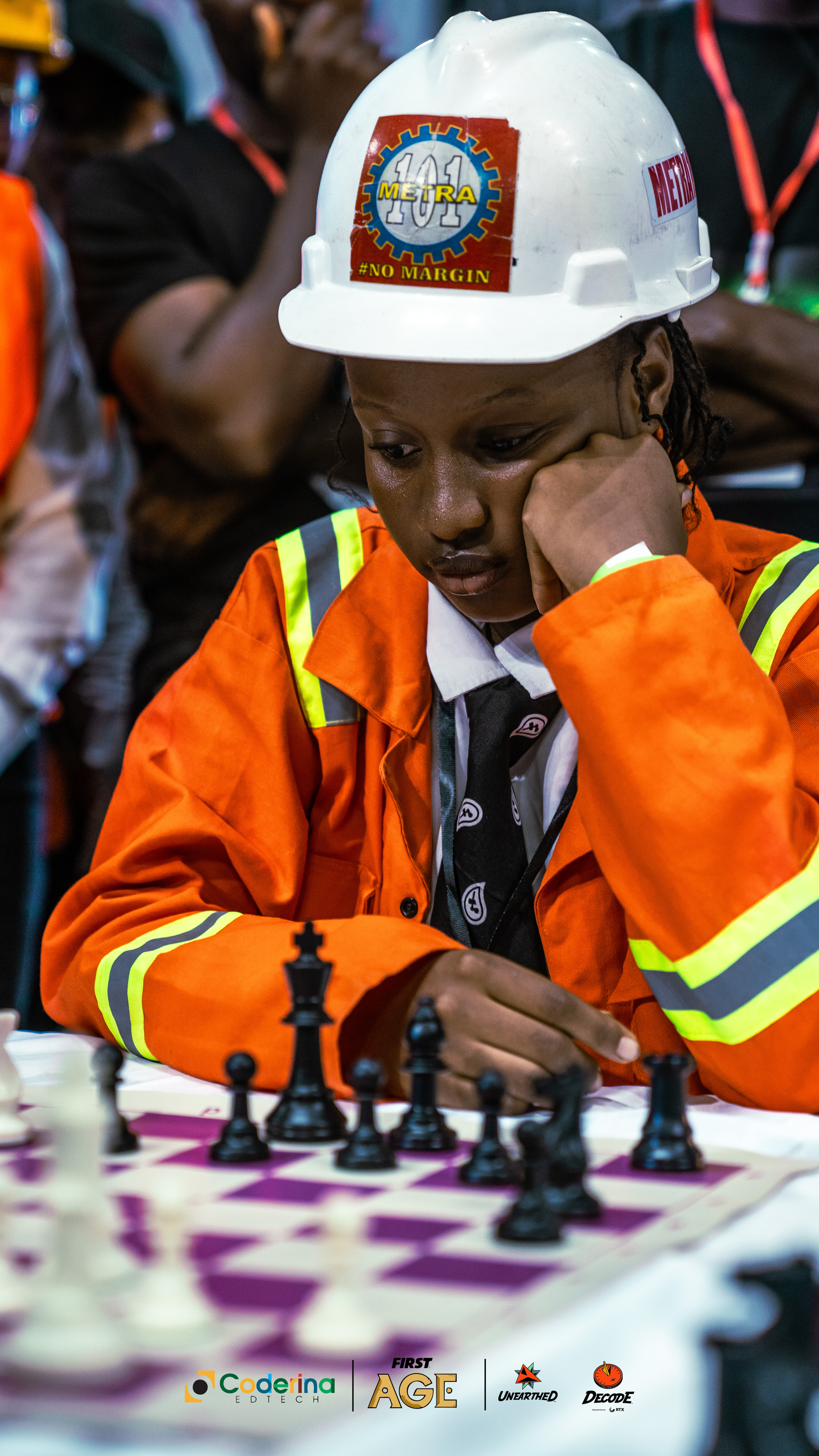 Young chess competitor focusing